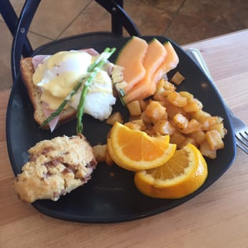 La Farm Bakery - Eggs Benedict served with potatoes, fresh fruit and a cinnamon scone. - Bakeries Near Me - Cary, North Carolina