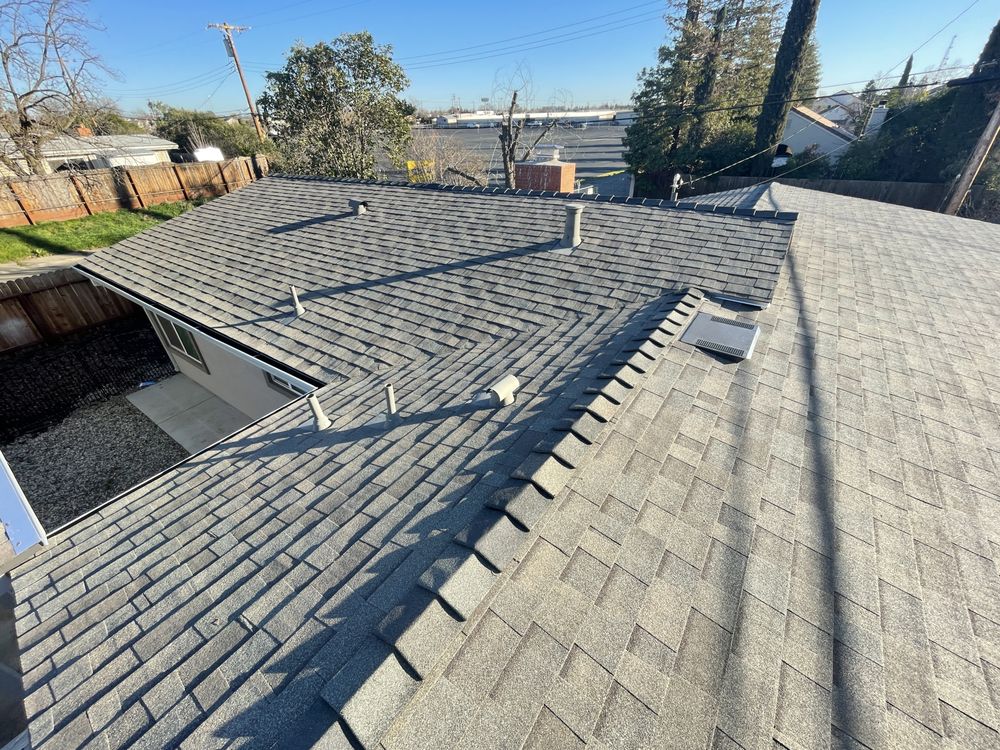 Slide of Triark Roofing