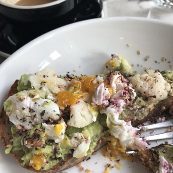 Black Bear Bread - Avocado and poached egg with pickled cauliflower on their homemade bread! Yum! - Breakfast & Brunch Near Me - Grayton Beach, Florida Black Bear Bread - Avocado and poached egg with pickled cauliflower on their homemade bread! Yum! - Breakfast & Brunch Near Me - Grayton Beach, Florida