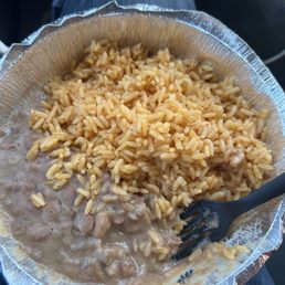 Side order of rice and beans to my delight was refried beans very authentic refried beans. Taste was perfect.