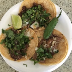 La Cocina Antojitos Mexicanos Taco Truck - Top clockwise: asada, carnitas, cabeza $1.25 each