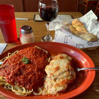 Little Italy - Eggplant parmigiana with spaghetti and a glass of Merlot - Pizza Near Me - Seneca Falls, New York Little Italy - Eggplant parmigiana with spaghetti and a glass of Merlot - Pizza Near Me - Seneca Falls, New York