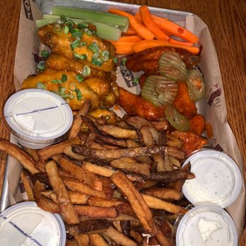 Jake Melnick's Corner Tap - Wing Combo - Bone In Firecracker and Nashville Hot - Sports Bars Near Me - Chicago, Illinois Jake Melnick's Corner Tap - Wing Combo - Bone In Firecracker and Nashville Hot - Sports Bars Near Me - Chicago, Illinois