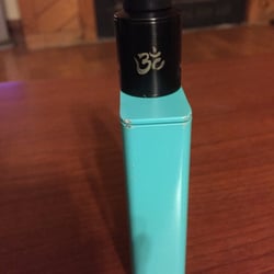Futuristic Vape - The dripper I got. Super easy, the "lid" snaps back on this model and I can just drop some juice right onto the cotton!