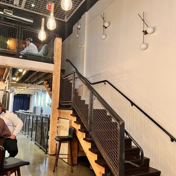 Antifragile Brewing - a man sitting at a bar - Breweries Near Me - State College, Pennsylvania