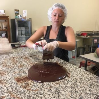 Wild Kauai Chocolate - Focusing really hard on tempering the chocolate just like Debbie showed us! - Chocolatiers & Shops Near Me - Kapaa, Hawaii Wild Kauai Chocolate - Focusing really hard on tempering the chocolate just like Debbie showed us! - Chocolatiers & Shops Near Me - Kapaa, Hawaii