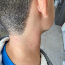 Great Clips - Rosie had the audacity to charge him as an adult, which resulted in an extra charge.