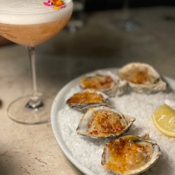 Manuela - Our second round of barbecued oysters and the Stonefruit Sour - New American Near Me - Los Angeles, California