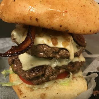 The Blue Rooster - This is the Big Nasty which is 2-8oz patties on a jalapeño sourdough bun. Really amazing everyone!! - New American Near Me - Flora, Mississippi