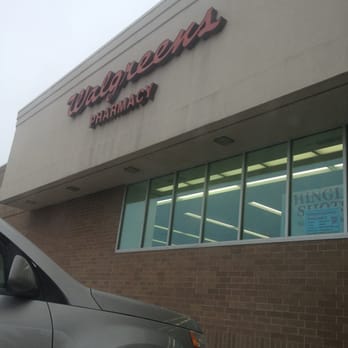 Walgreens - a car parked in front of the store - Drugstores Near Me - Livonia, Michigan