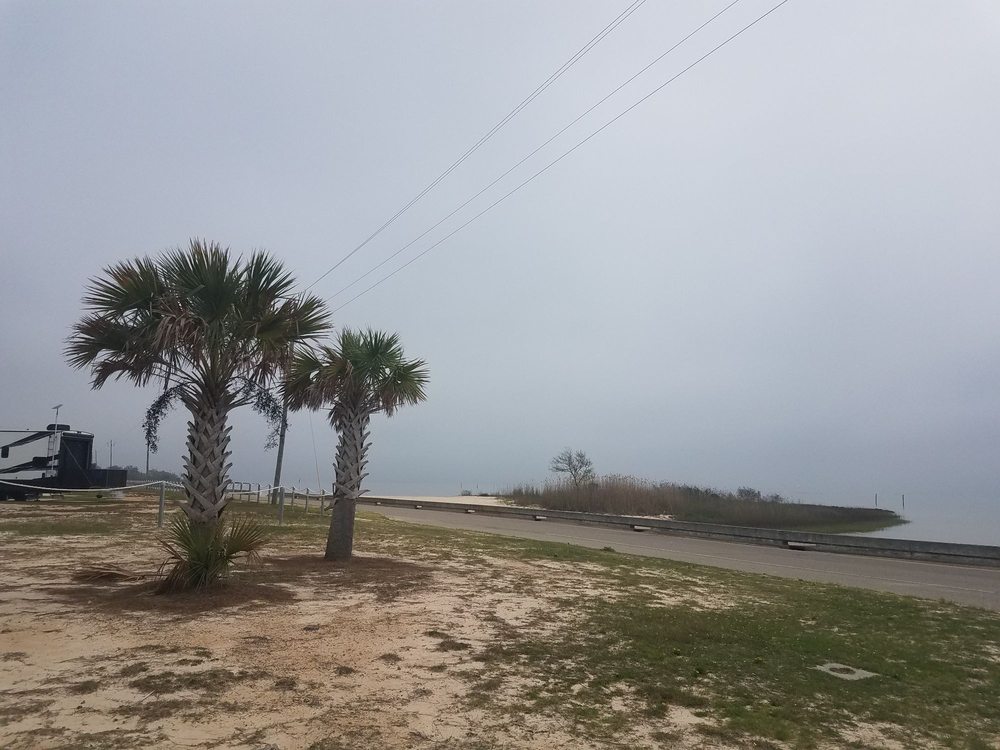 Waveland Beach Logo