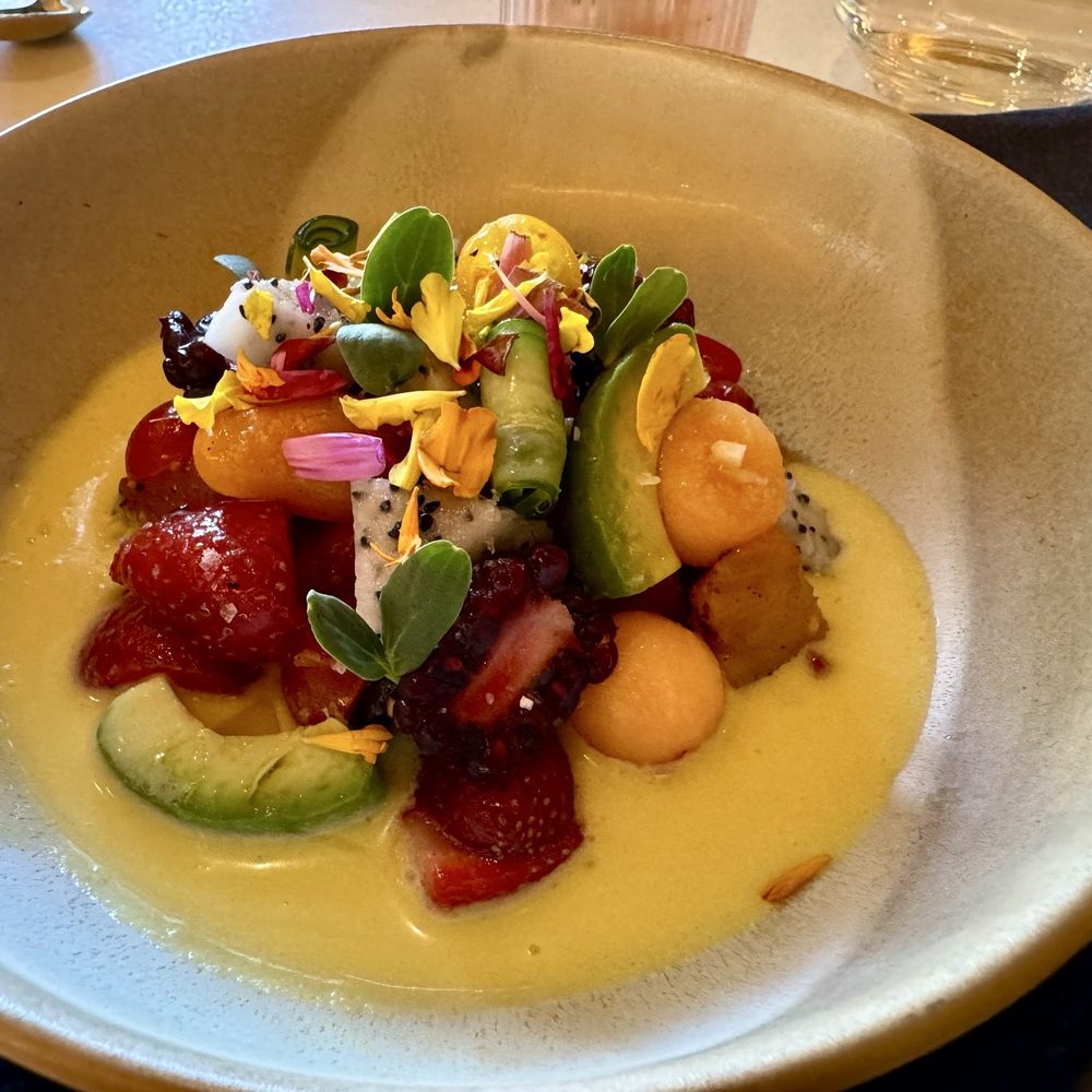 kann - Summer fruit salad with strawberry, avocado, charred pineapple, pickled cantaloupe, passion fruit coconut milk dressing. Yummy! - Caribbean Near Me - Portland, Oregon
