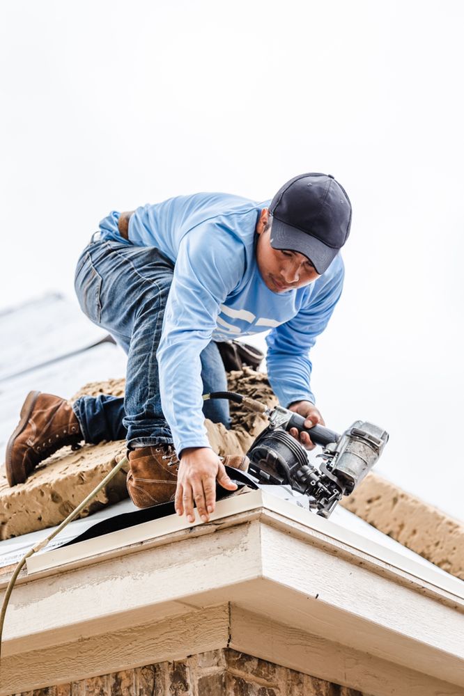 Slide of Snow Roofing and Exteriors