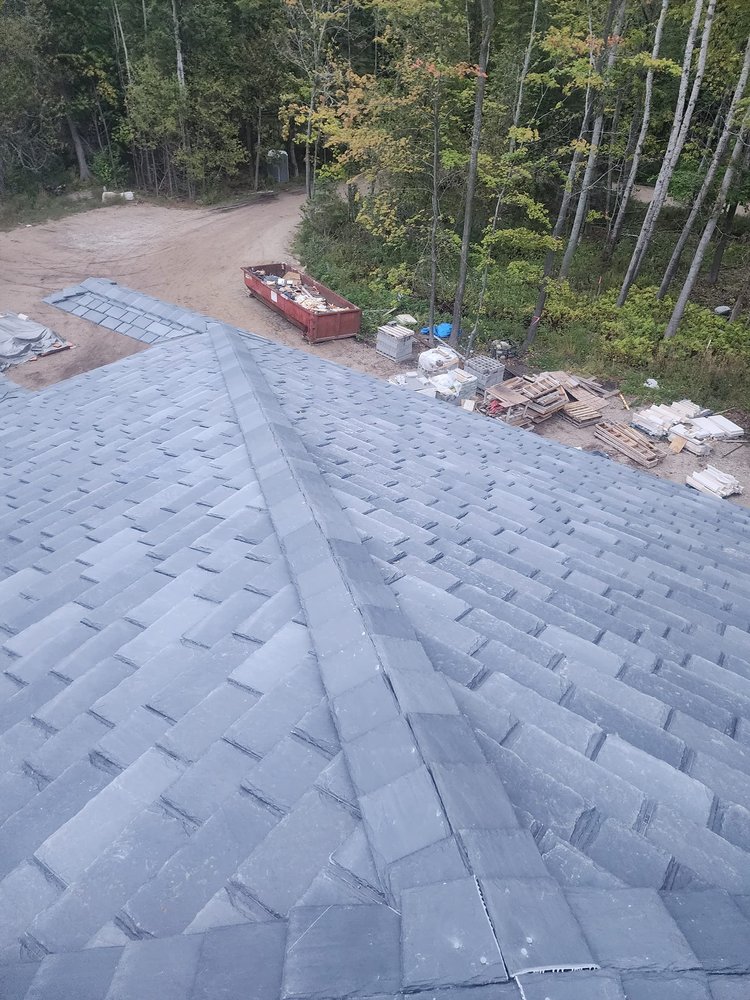 Slide of Archyk Roofing