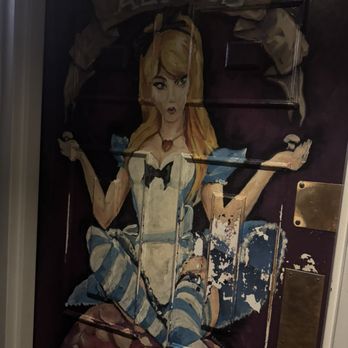 The Rabbit Hole - Ladies room door - New American Near Me - Colorado Springs, Colorado