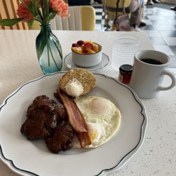 Johnny's - The Junior with bacon, English Muffin and eggs over easy plus a fruit bowl. - American Near Me - Half Moon Bay, California
