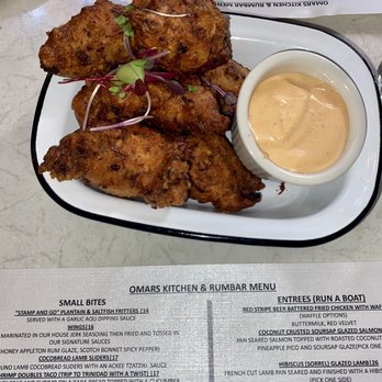 Omar's Kitchen and Rum Bar - "Stamp and Go" Plantain & Saltfish Fritters - Caribbean Near Me - New York, New York Omar's Kitchen and Rum Bar - "Stamp and Go" Plantain & Saltfish Fritters - Caribbean Near Me - New York, New York