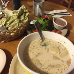 Clam chowder and salad with warm bread. Bread Comes with oil and vinegar, and butter.