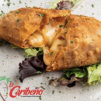 El Caribeno - a sandwich with cheese and lettuce - Puerto Rican Near Me - Houston, Texas El Caribeno - a sandwich with cheese and lettuce - Puerto Rican Near Me - Houston, Texas