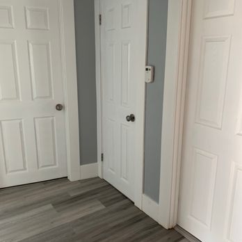 Royal Floors - two white doors and a hardwood floor - General Contractors Near Me - Oakland, California