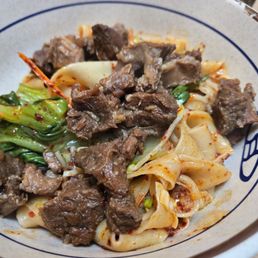 N.1.2 Chili Oil Noodles with Braised Beef (Wide Noodles) 红烧牛肉油泼面 (宽) N.1.2 Chili Oil Noodles with Braised Beef (Wide Noodles) 红烧牛肉油泼面 (宽)