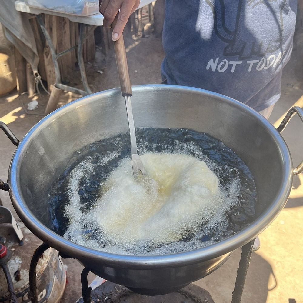 The Stand - Frying the bread fresh to order! - Food Stands Near Me - Scottsdale, Arizona The Stand - Frying the bread fresh to order! - Food Stands Near Me - Scottsdale, Arizona