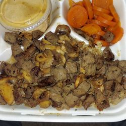 Tokyo Diner Japanese Restaurant Incorporated - Hibachi steak w/ mushrooms on a bed of rice and a side of carrots.