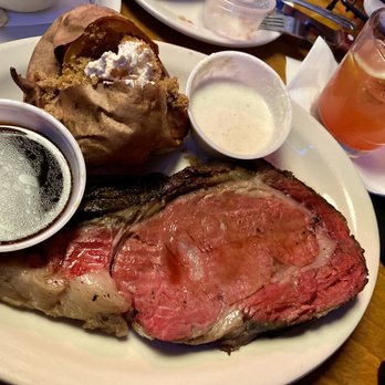 Texas Roadhouse - Prime rib (rare) and brown sugar sweet potato - Steakhouses Near Me - Melbourne, Florida Texas Roadhouse - Prime rib (rare) and brown sugar sweet potato - Steakhouses Near Me - Melbourne, Florida