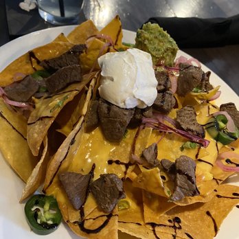 Local Goat - Steak Nachos - New American Near Me - Pigeon Forge, Tennessee Local Goat - Steak Nachos - New American Near Me - Pigeon Forge, Tennessee