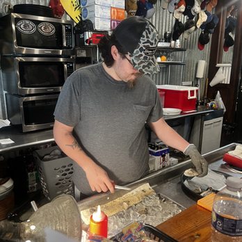 Hole In The Wall Seafood - Ryan, the best oyster shucker in Florida. - Seafood Near Me - Apalachicola, Florida