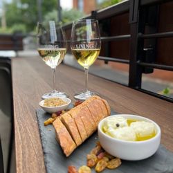 Living Roots Rochester - Two glasses of Vidal and a charcuterie board