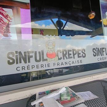 Sinful Crepes - Lovely outdoor table I'm seated st - French Near Me - Pompano Beach, Florida