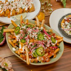 VOX Kitchen & Bar - South Coast Plaza - Carne Asada Fries. Part of our new Spring/Summer menu at VOX Kitchen & Bar.