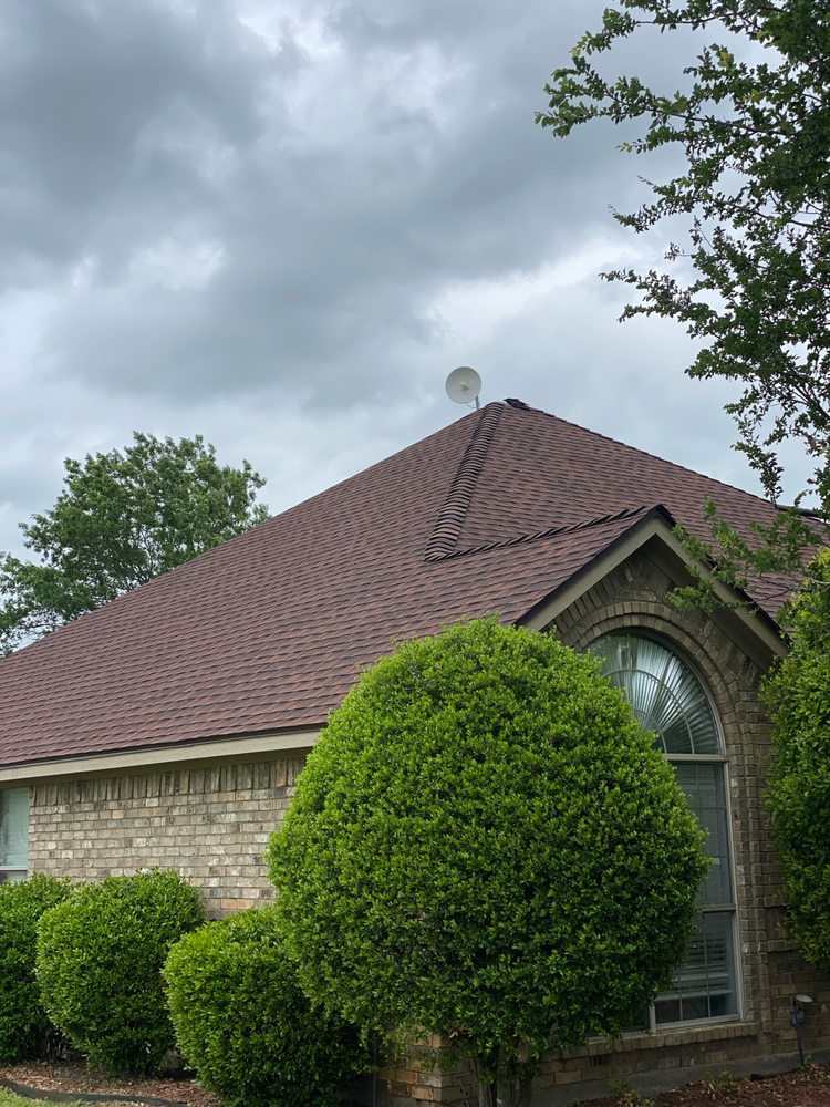 Slide of Mann & Sons Roofing