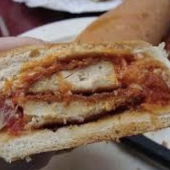 Deli News Pizza - This is a real NYC Chicken Parmigian Hero. Your sandwich will Not Look This Good!! - Italian Near Me - Long Beach, California Deli News Pizza - This is a real NYC Chicken Parmigian Hero. Your sandwich will Not Look This Good!! - Italian Near Me - Long Beach, California