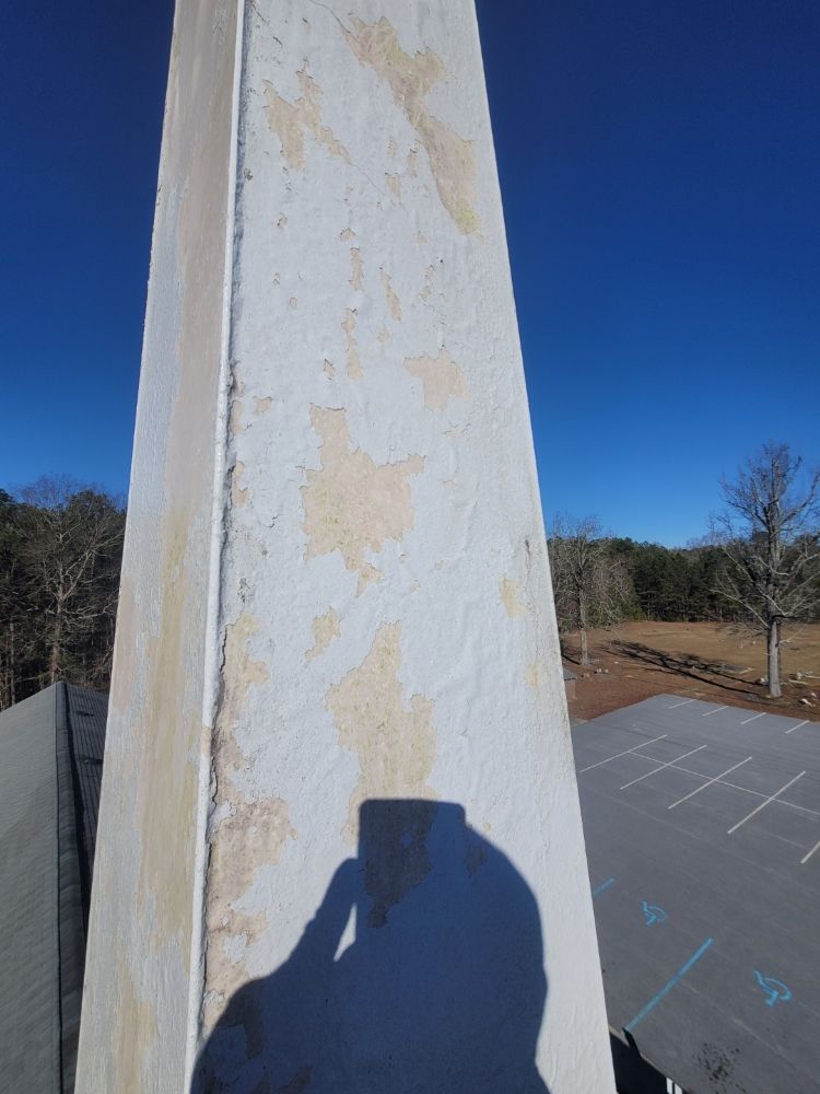 Slide of E. Thompson Roofing