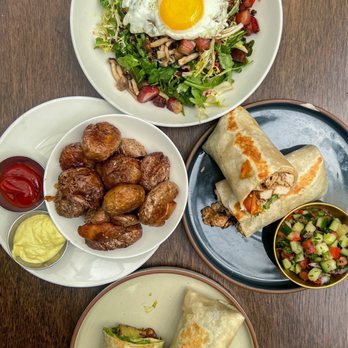 Sabine Cafe and Bar - Sabine Breakfast Burrito, Harissa Chicken Shawarma Wrap', Breakfast Salad, and Za'atar Potatoes - Cafes Near Me - Seattle, Washington Sabine Cafe and Bar - Sabine Breakfast Burrito, Harissa Chicken Shawarma Wrap', Breakfast Salad, and Za'atar Potatoes - Cafes Near Me - Seattle, Washington