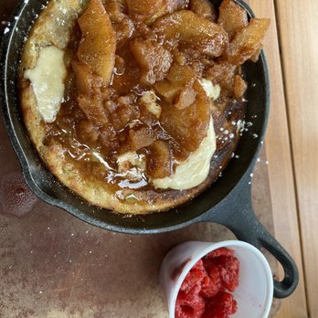 Trenchers Kitchen & Tap - Apple pancake w/ side of fruit - Gastropubs Near Me - Renton, Washington Trenchers Kitchen & Tap - Apple pancake w/ side of fruit - Gastropubs Near Me - Renton, Washington