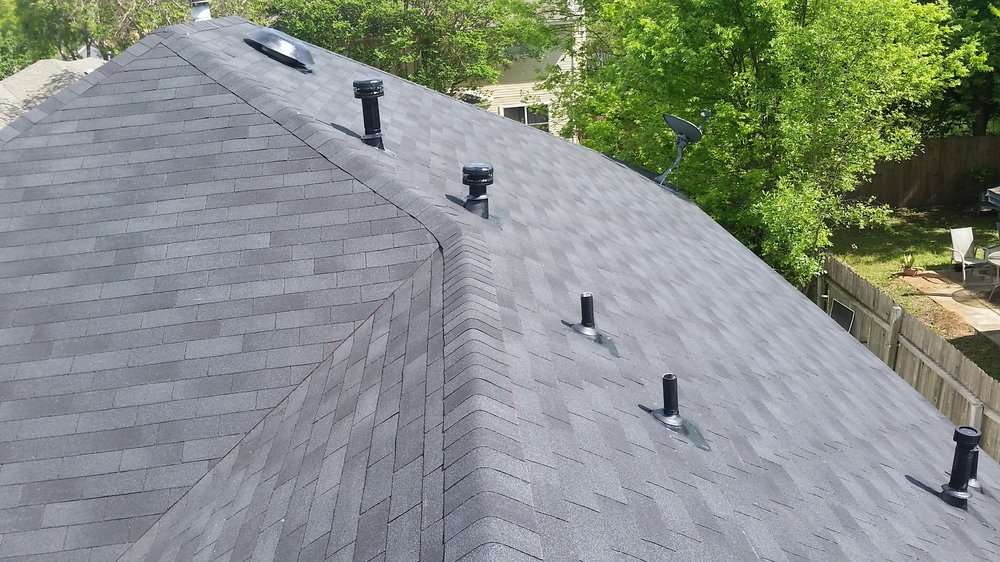 Slide of Austin Roofing and Construction