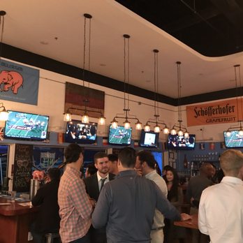 Tysons Biergarten - people at a bar - Beer Bar Near Me - McLean, Virginia