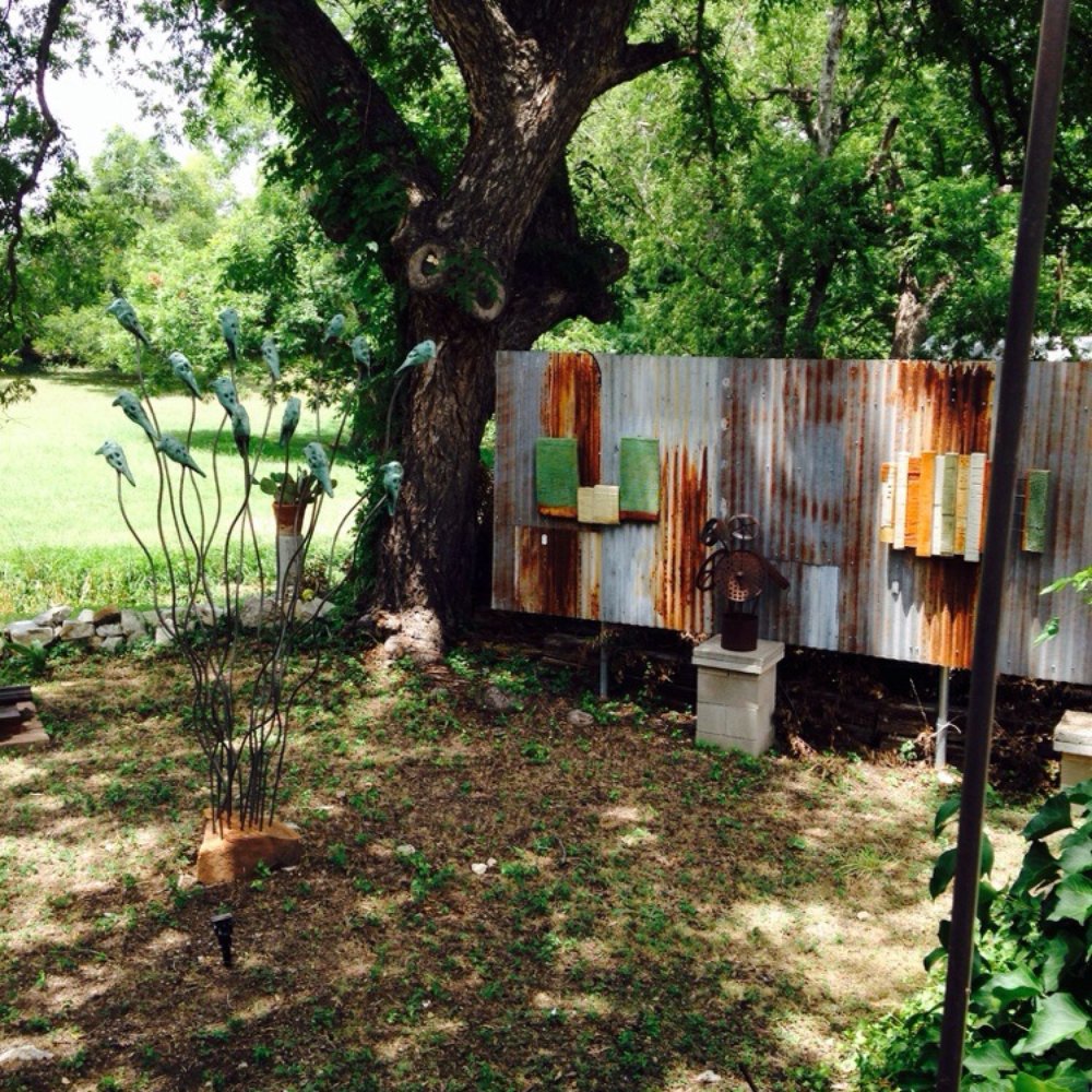 Kirchman Gallery - Interesting sculpture & rustic wall art outdoor area - Art Galleries Near Me - Johnson City, Texas