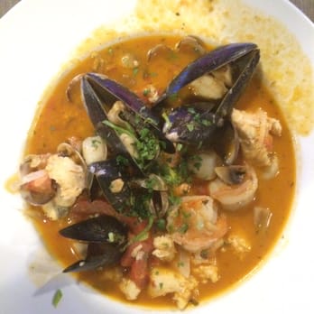 The Hook - Our dishes of NW Cioppino and Prawns Santorini. Needed a bit of spice, but we are Texan so... - Seafood Near Me - Edmonds, Washington