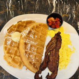Waffle, eggs and bacon.