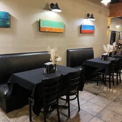 Moe's Pizza - Interior - great lighting, artwork, and table centerpieces