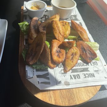 Afro Fusion Restaurant - Coconut rice with Salmon, fried plantains. - Tacos Near Me - Webster, Massachusetts