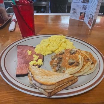 Polly's Pancake Parlor - Kathie's Combo w Plain Banana (special of the day) Pancakes w 2 scrambled eggs, ham, and sourdough - Breakfast & Brunch Near Me - Sugar Hill, New Hampshire Polly's Pancake Parlor - Kathie's Combo w Plain Banana (special of the day) Pancakes w 2 scrambled eggs, ham, and sourdough - Breakfast & Brunch Near Me - Sugar Hill, New Hampshire