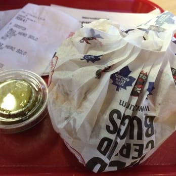 Hero Certified Burgers - Colossus - The wrapper was designed to open in a way to stay on with the burger, so you don't ever touch the burger with dirty fingers. - Burgers Near Me - Vaughan, Ontario Hero Certified Burgers - Colossus - The wrapper was designed to open in a way to stay on with the burger, so you don't ever touch the burger with dirty fingers. - Burgers Near Me - Vaughan, Ontario