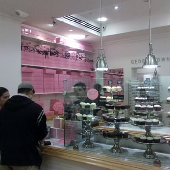 Georgetown Cupcake - 051611: cupcake boxes line the walls... - Bakeries Near Me - Bethesda, Maryland Georgetown Cupcake - 051611: cupcake boxes line the walls... - Bakeries Near Me - Bethesda, Maryland
