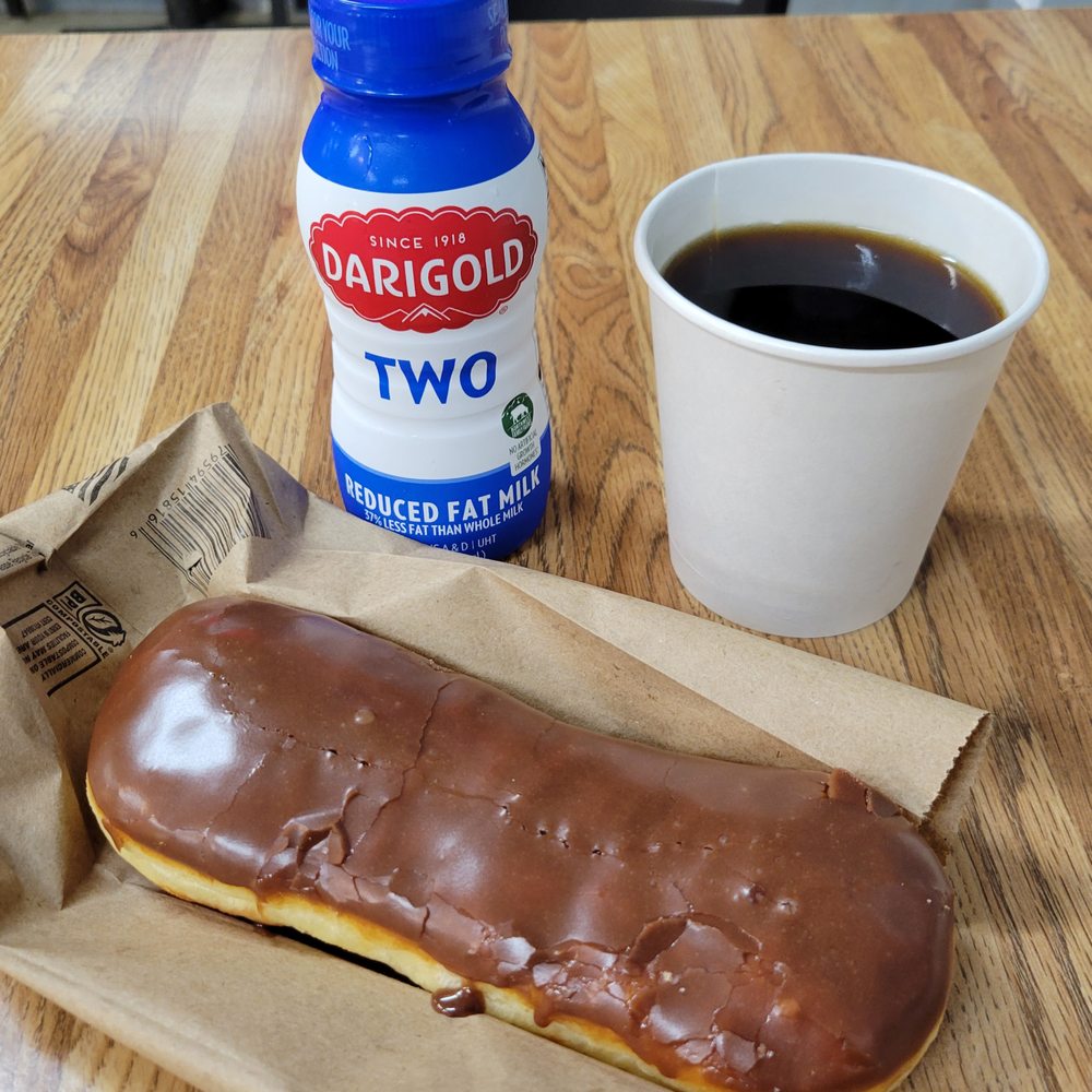 Westernco Donut - Start the day off right. Milk, Farmer's brand coffee and a traditional chocolate bar. - Donuts Near Me - Renton, Washington Westernco Donut - Start the day off right. Milk, Farmer's brand coffee and a traditional chocolate bar. - Donuts Near Me - Renton, Washington