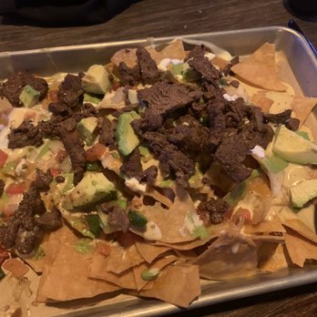 Pour Behavior - Beef tenderloin nachos - New American Near Me - Houston, Texas Pour Behavior - Beef tenderloin nachos - New American Near Me - Houston, Texas